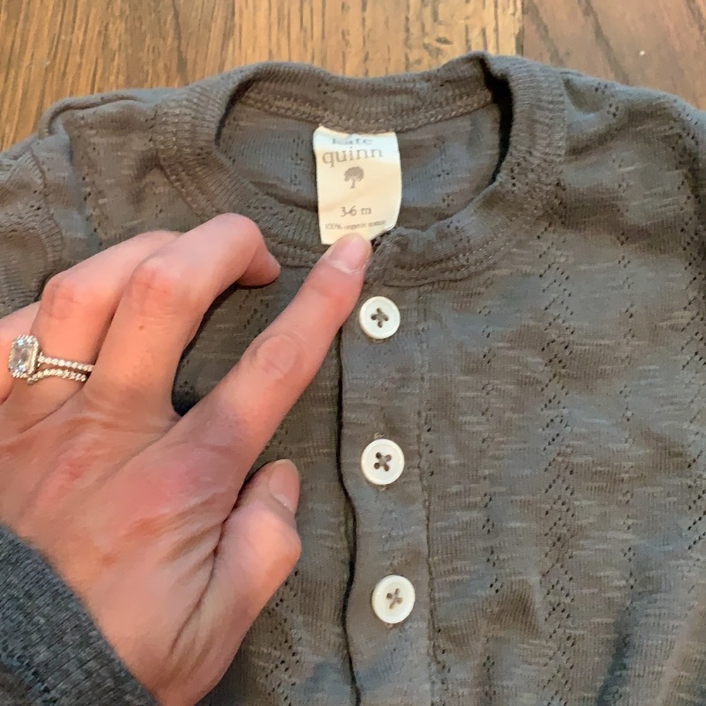 Kate Quinn long sleeve onesie